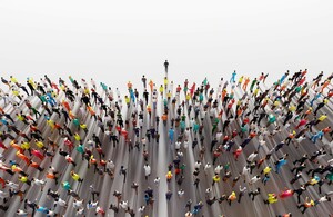 A large group of people - delivering value