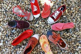 A circle of shoes of various styles and colours. How to do customer journey mapping to boost sales | jaconsulting.co.uk