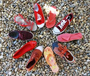 A circle of shoes of various styles and colours. How to do customer journey mapping to boost sales | jaconsulting.co.uk