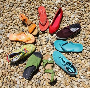 A circle of shoes of various styles and colours. 12 People, 7 Stages: Navigating the Complex B2B Buyer Journey | jaconsulting.co.uk